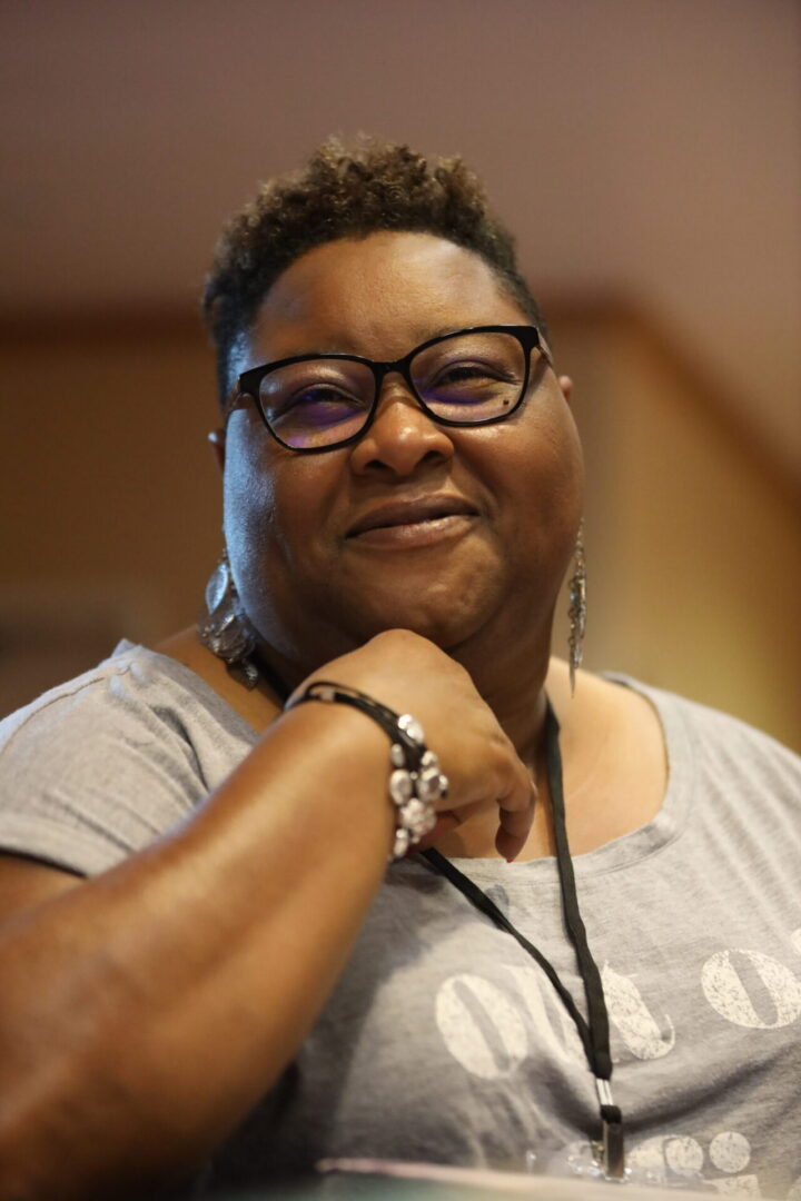 Woman wearing glasses and earrings