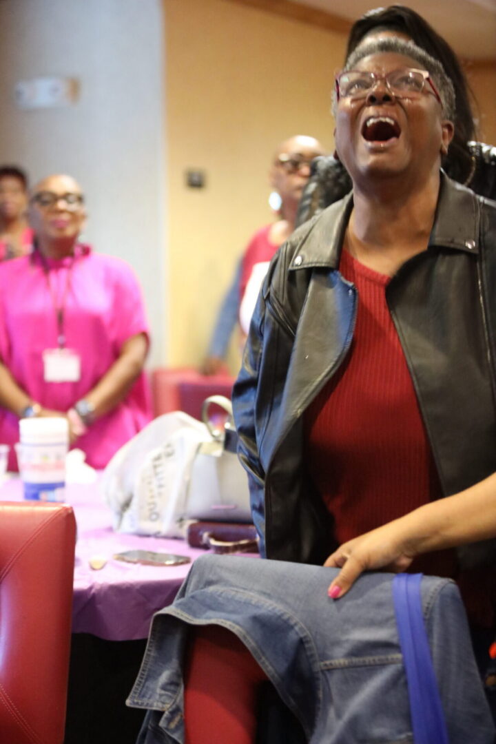Woman joyfully singing at an event